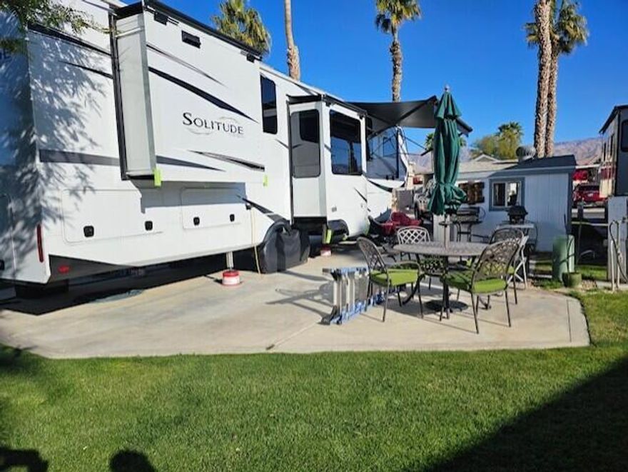 Wonderful RV/Motorhome Lot. Can handle 42 feet in length. Shed w/power and enlarged pad. Nice Green Belt behind.