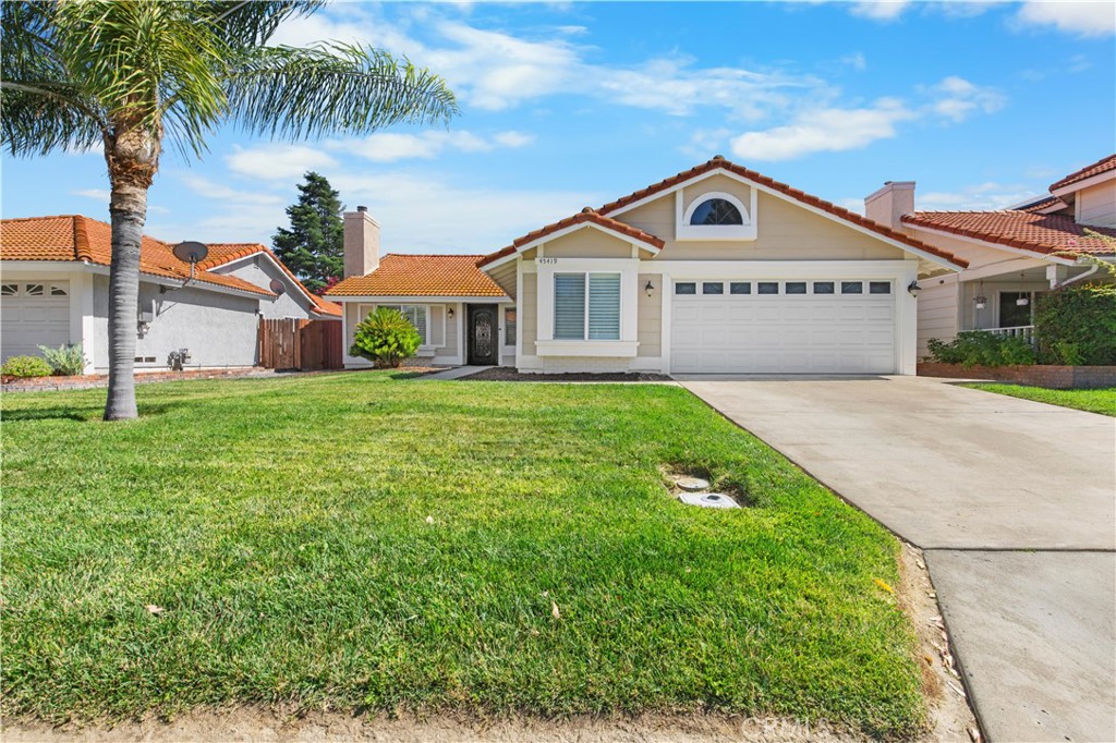 Welcome to 45419 Silverado Ln, a beautifully and meticulously upgraded home located in one of South Temecula's most desirable neighborhoods. Homes like this rarely come on the market, and now is your chance to call it home!
Step through the elegant custom front door and into a thoughtfully redesigned open-concept living room and kitchen. You'll find engineered hardwood floors, a vaulted open-beam ceiling, a custom fireplace, and designer lighting that fills the space with warmth and brightness for life’s best moments.
The chef’s kitchen is the star of the show, featuring a massive granite island with barstool seating, additional granite countertops, a commercial stovetop with an exhaust hood, custom cabinetry, stacked double refrigerators, and a double oven, perfect for hosting dinner parties and entertaining guests.
The primary suite is generously sized, complete with a spa-inspired bathroom that includes a custom walk-in rainfall shower and a beautifully built walk-in closet to store all your essentials. The two additional bedrooms are nicely sized and share a second upgraded bathroom, which also features a custom walk-in rainfall shower.
But that’s not all! One of the bedrooms, currently being used as an office, includes a hidden entryway to a media center/entertainment room. Outfitted with a projector, motorized drop-down screen, soundbar, and a custom-built bench with integrated charging ports, this cozy space is perfect for movie nights and bean bag lounging.
Additional highlights include a spacious backyard, a built-in storage shed, and a two-car garage with epoxy flooring and abundant modular storage. Best of all, fully paid Tesla solar panels and backup batteries ensure you’ll rarely worry about electric bills or power outages.
Located near Great Oak High School, top-rated hospitals, shopping, dining, wineries, and more. This is your opportunity to love where you live, right in the heart of Temecula.