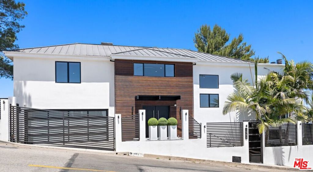 FANTASTIC MODERN HOME WITH PANORAMIC CITY LIGHTS & STUNNING RESERVOIR WATER VIEWS FROM EVERY ROOM! IN BEL AIR ON STRADELLA RD. DESIGNER PERFECT, SHOWS LIKES A MODEL HOME, LIGHT BRIGHT & OPEN DESIGN. LARGE OPEN LIVING ROOM, BEAUTIFUL GOURMET KITCHEN WITH CENTER ISLAND, NEW CUSTOM WALK-IN CLOSETS IN THE PRIMARY SUITE, GREAT OUTDOOR ENTERTAINING AREAS WITH POOL, BARBEQUE, PATIOS & DECKS.
