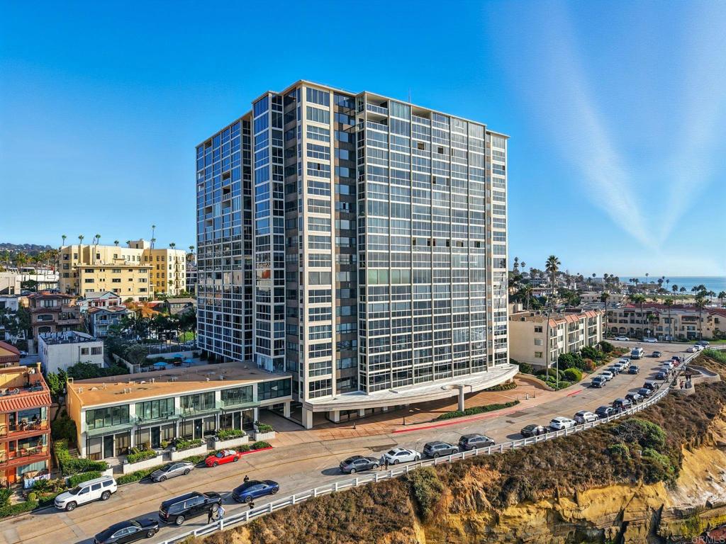 A Rare Oceanfront Penthouse Opportunity in La Jolla Perched atop the only luxury high-rise on Coast Boulevard, this oceanfront penthouse offers a once-in-a-lifetime chance to create a dream residence with unrivaled views of the Pacific and a patio too! Enjoy the lifestyle of a premier, service-rich building featuring 24-hour doorman, valet parking, on-site management, and guest suites—all designed to elevate comfort and convenience. The resort-style amenities provide the ultimate lock-and-leave living experience, perfect for those seeking both elegance and ease. Amenities include pool, spa, sauna, gym ,guest suites ,party rooms ,conference room ,library, billiard room. 24 hour doormen and valet services, on site management too, By enclosing the patio the square foot of the unit will be 1841! Seller to select services.