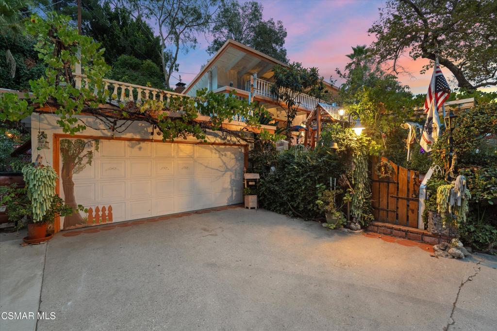 Nestled in Southwest Pasadena, this single-story cottage blends privacy, character, and modern updates. The home's hidden garden offers a rare sense of seclusion while still being minutes from city conveniences--and even close to the San Rafael Hills.Inside, the classic center-hall floor plan leads to three comfortable bedrooms and two stylish baths (one shower/tub combo and the other a walk-in shower). The wood floors--adorned with artistic medallions--add warmth and custom charm. The kitchen was refreshed in 2020 along with major system upgrades, including a new electrical panel, HVAC, and plumbing, ensuring peace of mind for years to come.Outdoors, the yard wraps gracefully around the property, creating multiple areas for gardening, play, or entertaining. The sparkling pool becomes especially magical at night, offering the perfect backdrop for gatherings. A two-car garage--accessed by steps from the backyard--is a rare amenity in this neighborhood, adding both storage and convenience.Additional highlights include thoughtful custom touches throughout and the unique positioning of the home on a peninsula of land between two streets, screened by mature plantings for enhanced privacy. This is a chance to own a retreat in a prime Pasadena location--where garden tranquility meets modern comfort.Some photos have been digitally altered.
