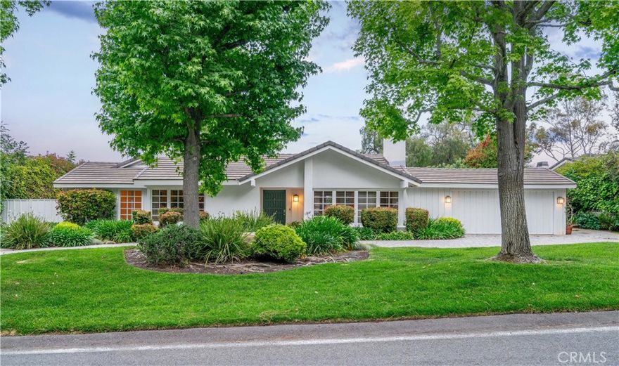 Prime location! This classic Rolling Hills ranch home is conveniently located on a quiet leafy street.  No neighbors across the street, this property offers privacy and solitude with the main noises being birds happily singing!  Trees, trails and tranquility await, and this sanctuary stands ready for its new owner to experience what makes living behind the gates so extraordinary!  Walking through the front door, you are greeted by multiple french doors that look out on the verdant backyard with pool and spa.  The home has 4 bedrooms, 3 baths and also has a guest house (approx 340 sq ft and not included in square footage) on the lower pad, nestled among lemon, lime, persimmon, peach and apricot trees.  Living room and Family room are situated on both sides of the entry and a kitchen with center island looks out onto a third living space. Canyons form the property boundaries on both sides of the property. Living in Rolling Hills is unlike any other community in southern California, so check out this unique family home and experience the comfort and solace and find your place!