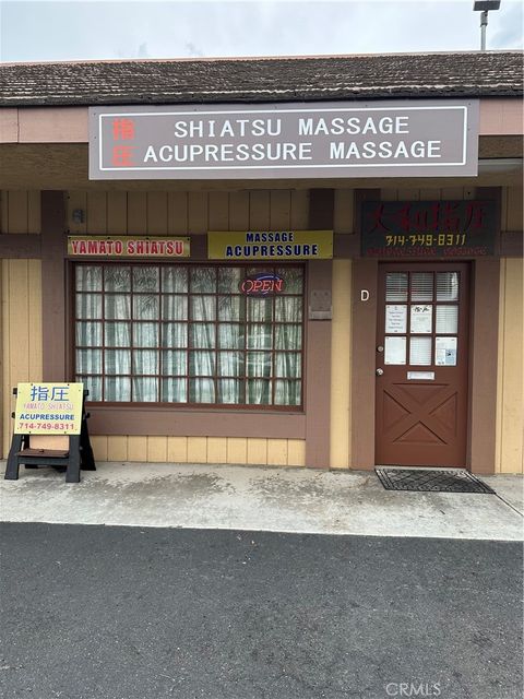 Photo of 14181 Newport Avenue #D, Tustin, CA 92780 (MLS # SB25268451)