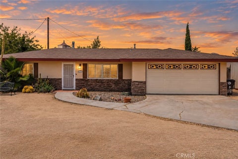 Photo of 57556 Pueblo Trail, Yucca Valley, CA 92284 (MLS # JT26139922)