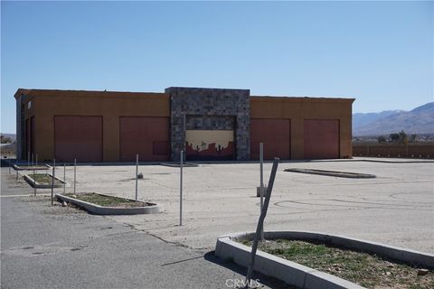 Photo of 22311 Bear Valley Rd, Apple Valley, CA 92308 (MLS # HD25242462)