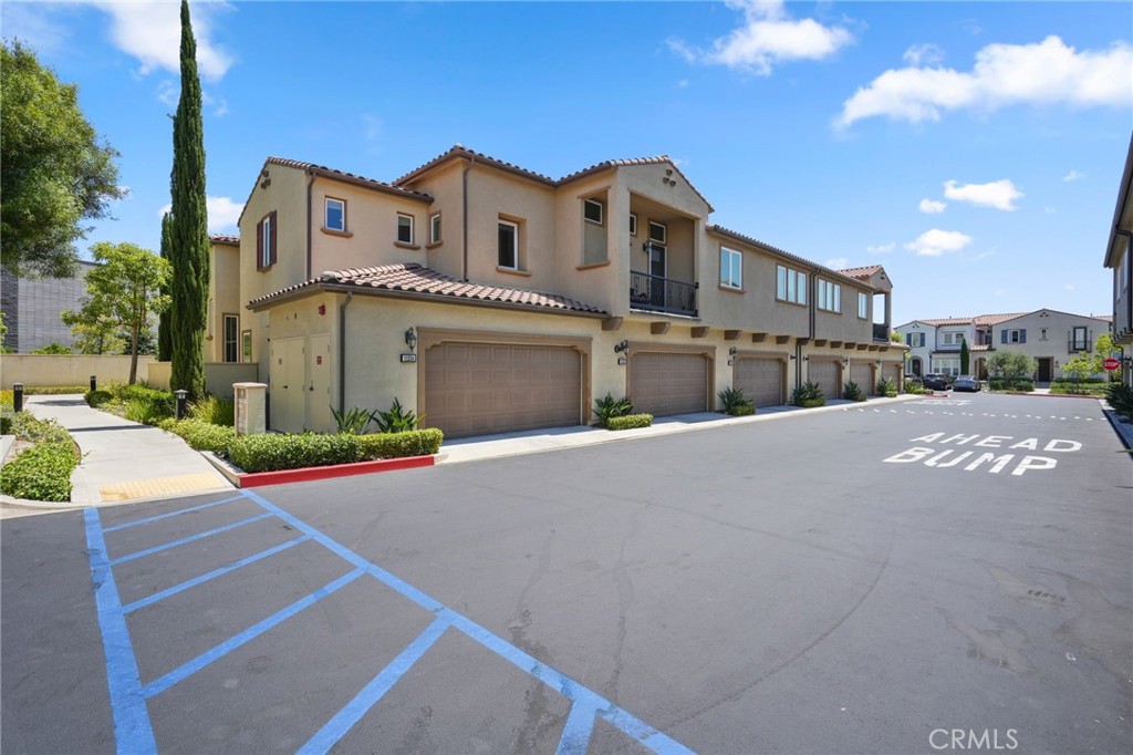Located in the highly desirable gated Seville community, this spacious two-story townhome offers 4 bedrooms and 3 bathrooms with a thoughtful floorplan. The main level features a bright living room, dining area, and a gourmet kitchen with granite countertops, pantry, and stainless steel appliances, including a stove/oven, microwave, trash compactor, washer, and dryer—all included for your convenience. A bedroom and full bath on the main level provide flexibility for guests or a home office. Upstairs, the master suite boasts a walk-in closet and a full bath with dual sinks. You’ll also find Two additional bedrooms, lots of storage/linen cabinets in the hallway, and a convenient upstairs laundry room. Enjoy your private patio surrounded by lush landscaping, perfect for outdoor relaxation. The home also includes a 2-car garage.Residents have access to HOA amenities such as a sparkling pool, spa, playground, and BBQ area. Conveniently located near the 118 Freeway, Vineyard Shopping Center, restaurants, hospital, Whole Foods Market, and within the sought-after Porter Ranch Community School (K–8) boundary.