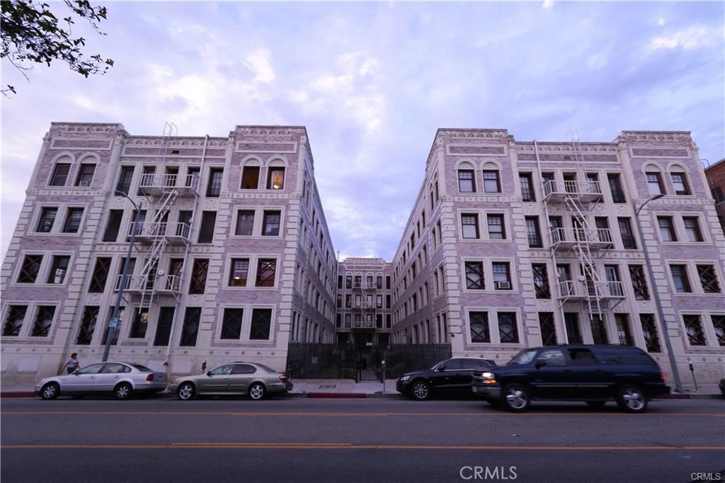 All UTILITIES INCLUDED IN RENT. Charming Remodeled Studio in Historic Building – Prime Location Between Downtown LA & Mid-Wilshire. This beautifully remodeled studio is located on the second floor of a building, offering the perfect blend of vintage charm and modern updates. With soaring 9-foot ceilings, open floor-plan, pergo flooring, and an abundance of natural light, this home has character and warmth. The remodeled kitchen features custom cabinetry, stone countertops, and includes a refrigerator and stove. A large closet space for an office or extra storage. The bathroom boasts a tub, and the unit offers a peaceful city view. Residents enjoy access to a secured courtyard entrance, an elevator, and multiple staircases. The building has been retrofitted for earthquake safety, ensuring peace of mind. The location couldn’t be more convenient: just three blocks from the Westlake/MacArthur Park Metro Red Line Station, and within walking distance to LA Live, Downtown, the Staples Center, FIDM, USC (1.5 miles), and Loyola Law School. The monthly HOA fee covers all utilities (except cable) and includes free Wi-Fi in common areas, community laundry, a library, a piano, billiard and ping-pong tables, bike racks, and a fully equipped exercise room. While there is no parking structure on-site, ample third-party parking options are nearby, with the closest lot located just 900 feet away at 942 S. Alvarado St. Perfect for a first-time homebuyer—make this charming unit yours today!