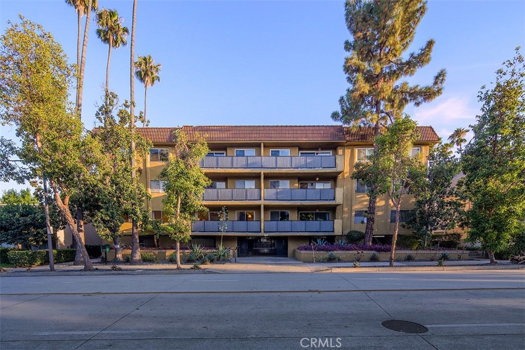 Experience the best of Pasadena living! Nestled in the sought-after Madison Heights neighborhood, this condo offers the perfect blend of city convenience and serene treetop views. With an impressive Walk Score of 80, you’re just a short stroll northeast to Lake Avenue or northwest to Old Town Pasadena—where you’ll find The Paseo mall, charming boutiques, acclaimed restaurants, museums, spas, the Playhouse District, movie theaters, sought after schools and colleges. Step inside to a bright, open-concept entry and living room that flows seamlessly to your private balcony—perfect for morning coffee or evening relaxation. The spacious dining area sits beside a well-appointed galley kitchen featuring a dishwasher, microwave, and gas stove. The first bedroom boasts a generous double closet, while the hall bath includes an oversized vanity and extra storage. The primary suite offers the luxury of a double walk-in closet and a private bath with another oversized vanity and even more storage space. Located just across the hall from the elevator, you’ll enjoy easy access—only one floor down to the lobby, garage entry, and your two tandem parking spaces (#4). Community amenities include a fitness center, meeting room, and laundry facilities. City living, tree-top tranquility, and unbeatable location—it’s all here waiting for you!