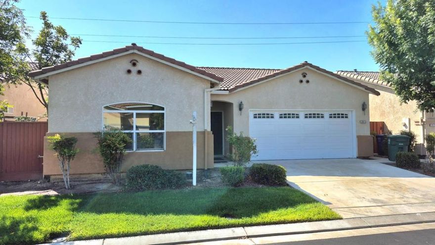 Welcome to this beautifully maintained 3-bedroom, 2-bathroom home offering 1,370 sq. ft. of comfortable living space.  Located in a desirable gated community with access to a clubhouse and community swimming pool. Inviting open-concept layout featuring water-proof flooring, fresh paint throughout, a cozy electric insert fireplace, and a charming breakfast nook. The kitchen boasts granite countertops, while the bathrooms include a double sink vanity with granite counters and a bathtub with shower stall for convenience.  Additional features include: Spacious 2-car attached garage and forced central heating and air conditioning for year-round comfort.  This home offers both style and practicality, set in a secure community with great amenities.  No age-restriction to purchase or own this home. Perfect for comfortable living and easy entertaining!