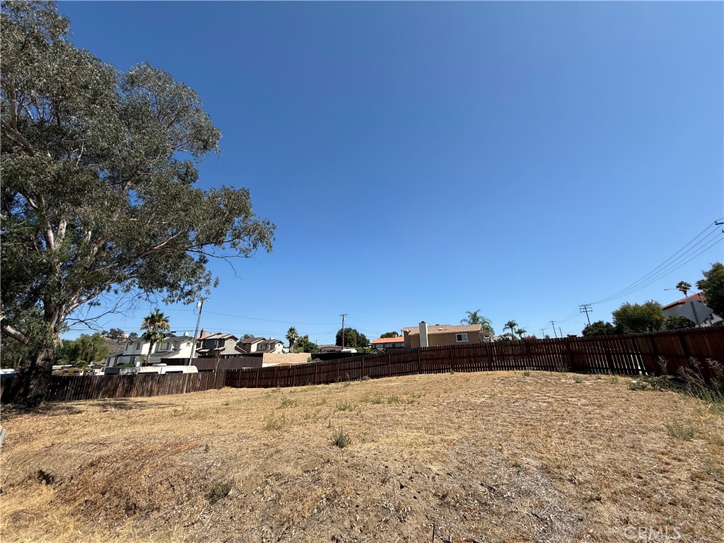 Incredible opportunity to own a piece of land directly across the street from Lake Elsinore! Enjoy beautiful lake views from across the street. Located just minutes from downtown Lake Elsinore, with quick access to shopping at Walmart and Home Depot, and only a 5-minute drive to the freeway for an easy commute. Surrounded by new townhome construction, this lot includes both convenience and promising investment potential in one of the fastest-growing parts of Riverside County.