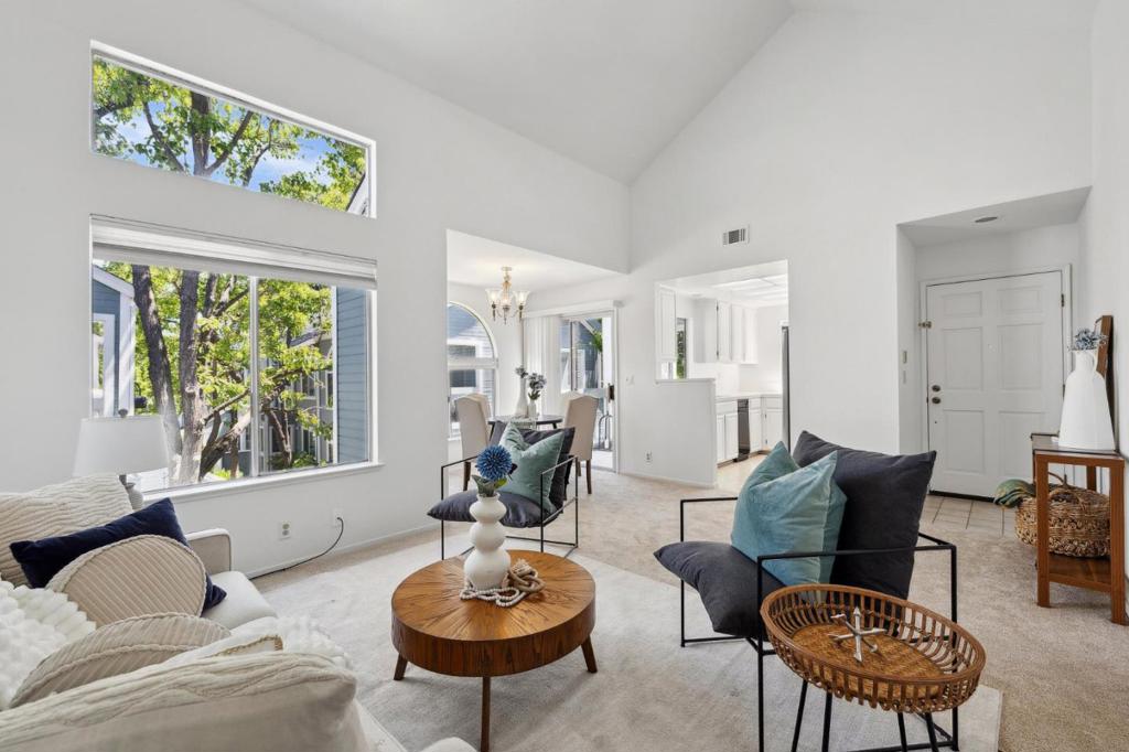 OPEN Sunday 7/13 1-4PM! Price Improved! Welcome to this 2nd floor light & bright move-in ready end-unit home w/new carpet throughout! Nestled in a sought-after waterfront community, this thoughtfully-designed space is ideal for first-time buyers, roomies, or down-sizers! Open-concept LR & Dining Rm flow seamlessly. Volume ceilings & palladium windows foster an outdoors-in vibe! Freshly painted kitchen offers double oven, electric cook-top, microwave, dishwasher, trash compactor - meal prep's a breeze! Two spacious bedrooms, each with generous closet space. Take your morning coffee or evening libation on screened balcony. Convenient in-unit laundry, washer/dryer included! 1 Car garage has automatic opener, some built in shelves for extra storage. Additional assigned parking space, plus Guest Parking right at walkway to the home. Water & Trash included in HOA. Enjoy the best of Cali living w/access to lush bayfront trails for walking, running, paddling and biking, plus a community pool and spa excelent for relaxing weekends. Short walk to tennis & pickleball courts, library. Commuters dream w/quick access to 101, Caltrain, SFO, San Carlos airport. Major employers nearby: Oracle, Facebook, EAGames, Box & Stanford. First Time Buyer financing available! Rent-to-Own?
