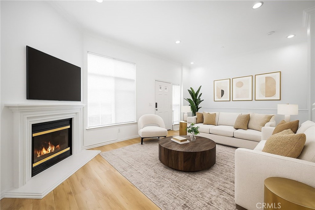 Welcome to 5740 S Glennie Ave, Unit C—a beautifully updated townhome offering 3 bedrooms, 2.5 bathrooms, and a flexible den across 1,522 square feet of well-designed living space. With a blend of modern finishes and thoughtful upgrades, this home delivers both style and function in one of Mid-City Los Angeles’ most convenient locations. The heart of the home is the main level showcasing the open concept living space complete with a gas fireplace connecting to the fully remodeled and expanded kitchen—featuring sleek white cabinetry, quartz countertops, stainless steel appliances, and a large center island ideal for casual dining or entertaining. The kitchen was thoughtfully reconfigured to expand and add in additional cabinetry and a pantry space providing ample storage space where you need it most. Soaring vaulted ceilings and recessed lighting create a bright, airy feel that makes the space feel even more expansive. The vaulted ceilings continue to the beautiful staircase taking you to the three bedrooms including the the spacious primary suite which feels like a true retreat. Unwind in your spa-like ensuite featuring a large jetted soaking tub, walk-in shower, dual vanity, private water closet, and a generous walk-in closet with plenty of storage. Two additional bedrooms and a remodeled full bathroom complete the upper level, while a convenient half-bath and laundry closet are located on the main floor. The attached 2-car garage offers direct interior access for added ease and security. An incredible bonus on the lower level includes a flexible den space—perfectly suited for a home office, gym, playroom, or a private guest space. Whether you work from home or need a creative corner, this space adapts effortlessly to your lifestyle and the individual needs you have for your home. Situated minutes from the 210 and 60 freeways, you’re perfectly positioned to access Downtown L.A., nearby shops and dining, and everything Mid-City has to offer. Modern upgrades, flexible space, and a central location—this townhome checks all the boxes for elevated city living and is a unique opportunity on the market today!