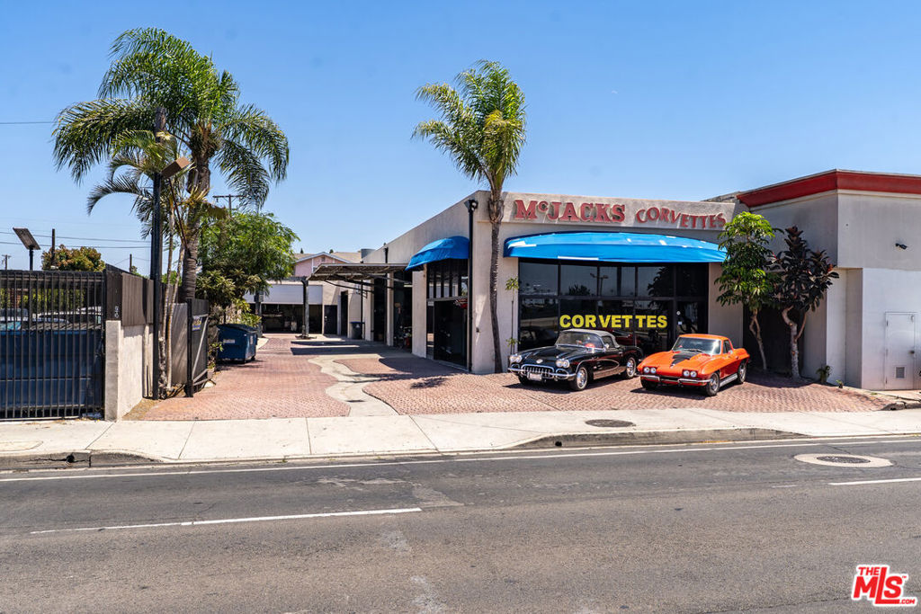 We are proud to present 411 S. Harbor Blvd, a rare and iconic auto body facility for sale in the heart of Santa Ana. With over 40 years of continuous operation as the legendary McJack's Corvettes, this 5,000 SF freestanding building on an 8,276 SF lot offers an exceptional opportunity for both owner-users and investors alike. Located on Harbor Blvd with 46,000 cars passing daily, the property delivers unmatched visibility, signage potential, and customer exposure along one of Orange County's most heavily trafficked commercial corridors. For the hands-on operator, this is a once-in-a-generation chance to acquire a fully entitled, turnkey auto body site currently used as a retail or wholesale Corvette dealership. For investors, the building commands strong rental appeal with limited supply of similar facilities and projected rents of $3.25/SF NNN ($16,250/month). Whether you're looking to expand your footprint or secure a cash-flowing, automotive-zoned asset with legacy appeal, 411 S. Harbor Blvd delivers on every front. Owner will consider a seller carry back loan at reasonable price and terms. Property Summary: Building Size: 5,000 SF, Lot Size: 8,900 SF With over 46,000 cars passing by daily, this high-visibility Harbor Blvd location offers unmatched exposure for any automotive operation. Zoning: Harbor Mixed Use (SP-2) permits automotive sales, service, collision repair, specialty uses. Currently used as a retail or wholesale Corvette dealership. Use Case: Ideal for automotive collision repair, vintage restoration, vehicle customization, and boutique car sales. Facility Features: A fully operational downdraft spray booth with microwave, drying system, Seven Hydraulic auto lifts, one being a drive-through, muffler lift and another outside for steam cleaning, Drive-up access with multiple roll-up doors and service bays, Dedicated frame, fiberglass and metal bodywork, muffler and detail stations, In-house engine, transmission work and interior reconditioning area, Client reception, showroom and office area, Secure gated yard with front space for vehicle display, Plenty of room for parts and file storage, high-amp electrical service, gas, water, telephone, cable and fiber utilities, Upgraded lighting, and integrated compressed air with steel air lines throughout, Zoning & Permitted Uses: Located within the Harbor Mixed Use Specific Plan (SP-2) zone, the site allows for: Auto body and collision repair, Vehicle customization and fabrication, Specialty and classic vehicle sales, Parts distribution and warehousing, Paint and detailing operations, Current use: retail or wholesale Corvette dealership. The property currently operates legally as a full-service auto body and restoration facility. The property is fully equipped and properly zoned for continued automotive use, allowing for a seamless transition into operations without the need for rezoning or conditional use permits.