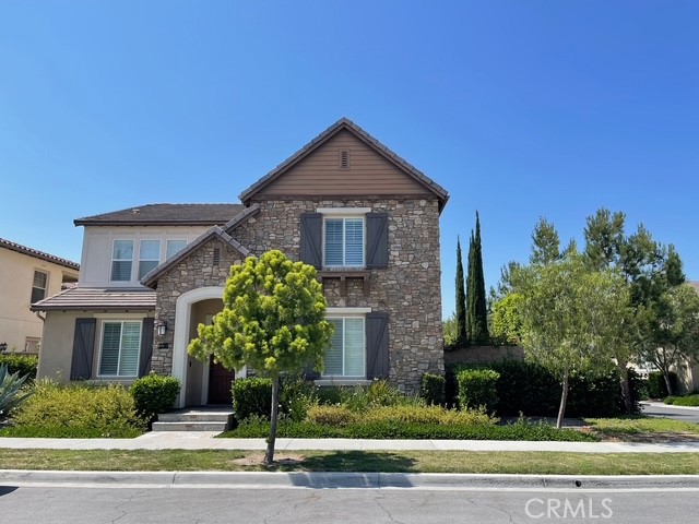Welcome to the stunning, turnkey home at the Greenwood community! immaculate 4-bedroom, 4-bathroom (one bedroom and bath downstairs) offers the perfect of luxury, comfort, and convenience. Built in 2016 and meticulously maintained. The bright and open great room flows effortlessly into the chef-inspired kitchen, complete with granite countertops, a large center island, and top-of-the-line KitchenAid appliances. The versatile main floor bedroom can serve as a guest room, home office, or den. Upstairs, the luxurious master suite boasts dual vanities, a soaking tub, a separate tiled shower, and an expansive walk-in closet. The beautifully landscaped outdoor space, featuring a California Patio and BBQ area, is perfect for entertaining. Residents enjoy resort-style amenities, including a pool, spa, clubhouse, and the expansive 6-acre Ron Foell Park, all within easy reach of top shopping and dining destinations and major freeways.