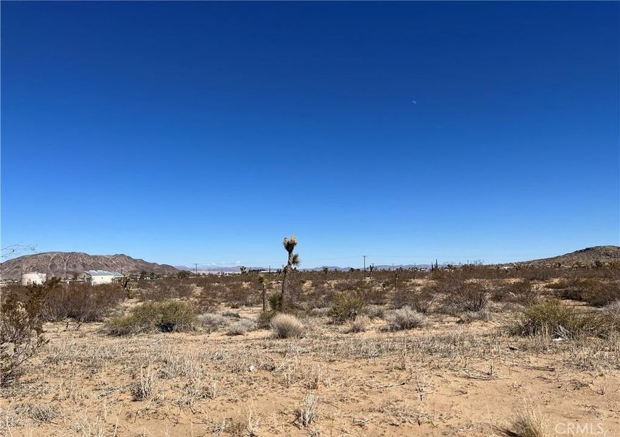 Beautiful, flat 5.152-acre parcel in the heart of Landers—ready for development. Power lines are conveniently located at the street, with neighboring homes already established in the area, making this an ideal opportunity to build your custom desert retreat or full-time residence.

Located near the Landers Post Office at the corner of Reche Road and Landers Lane, this property offers a prime, accessible location while still delivering the wide-open space and tranquility Landers is known for.

The lot is easily accessed and can be viewed from the corner of Barter Road and Fordham. A perfect setting to bring your vision to life in one of the High Desert’s most desirable and up-and-coming areas.