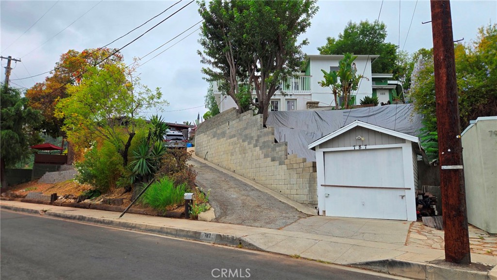 Fantastic FLIP opportunity! Positioned in one of Los Angeles' most ideally-located neighborhoods. Attention investors this home sits on a spacious sized lot with 8,469 sq ft., offering incredible potential for a complete renovation or a flip. A standout feature of this property is the long driveway, providing ample parking for multiple cars. Even further it is set on a hillside with views of the mountains from the permitted open deck. It has the elements to create your own private compound. This home is just a short distance from both York and Figueroa Blvd, where you can enjoy a variety of restaurants, coffee shops, stores, schools, parks, and more. It's also a short drive to Pasadena, Downtown L.A., and Occidental College. Easy access to major highways, you're well-connected to the best that Highland Park and the surrounding areas have to offer. !!!!!!! PROPERTY TO BE SOLD "AS IS"CONDITIONS. ALL "CASH ONLY". Please research the property before submitting any offers and do not submit blind offers! All offers will be shown to the seller.