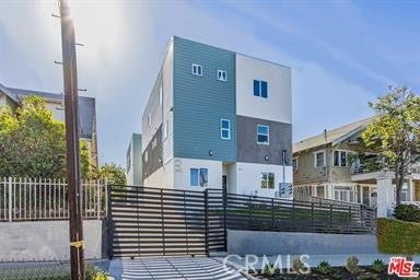Photo of 1143 1/2 Irolo St St, Los Angeles, CA 90006 (MLS # PW26102697)
