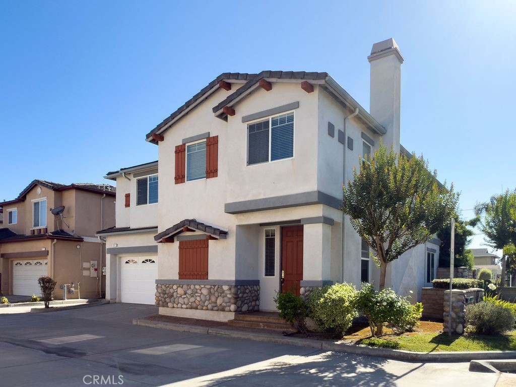 Welcome to this elegantly updated, end-unit, detached condo in the desirable "The Coves" community. Built in 2005, this 4-bedroom, 3-bathroom home features a versatile floor plan with a convenient downstairs bedroom and full bathroom, perfect for guests or multi-generational living. Enjoy an open layout filled with natural light, high ceilings, and newer interior paint. The remodeled kitchen boasts a granite island, sleek countertops, and stainless steel appliances, seamlessly connecting to spacious living and dining areas. Additional highlights include dual-pane windows and a two-car garage with epoxy flooring. Located at the front of a quiet cul-de-sac in a community of just 10 condos, you’ll love the privacy and neighborhood feel. Close to several parks and assigned to award-winning Luther Elementary, Walker Junior High, and Kennedy High School, this turnkey home is truly move-in ready!