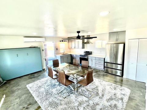 Photo of 2774 Kickapoo Trail, Landers, CA 92285 (MLS # 219138991DA)