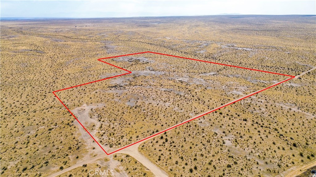 30 Acres of Opportunity in Helendale – Seclusion & Accessibility Combined! Discover the perfect blend of privacy and convenience with this 30-acre parcel in Helendale! Offering flat, build-ready terrain and breathtaking desert views, this versatile land is ideal for a custom home, eco-friendly retreat, agricultural venture, or livestock operations. Easily accessible – 90% of the road is maintained. Property is clearly marked for easy identification.
This is a rare opportunity to own a piece of desert paradise with endless possibilities! Note: Please use GPS to locate the property; the address provided is for marketing purposes only. Buyers to verify zoning, lot size & dimensions independently.
