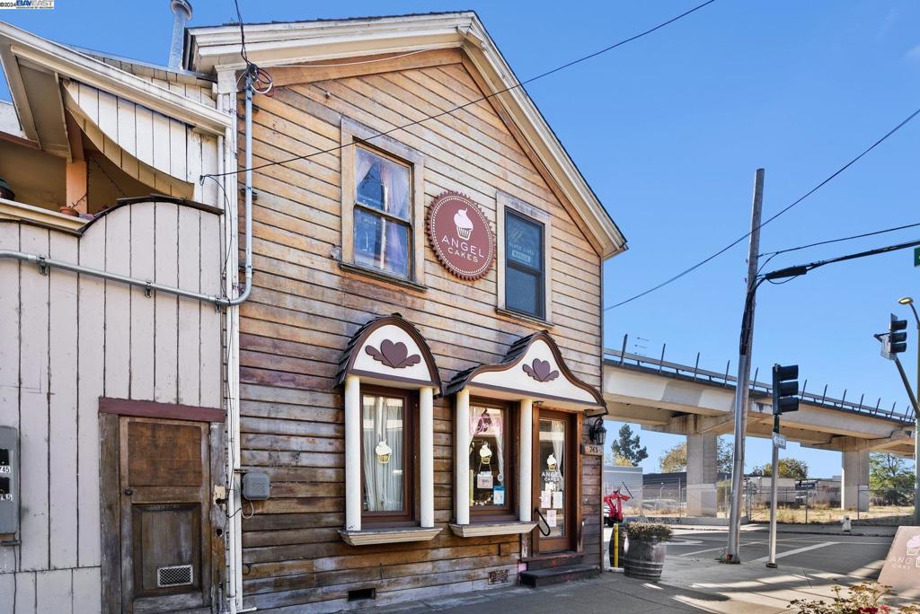 Own a piece of history with this iconic building, this was once the Gingerbread House Restaurant. This amazing opportunity consists two parcels and 3 buildings in total with charming outdoor space. 745 5th St is a 2 story Victorian on the corner with Angel Cakes Bakery and a 2 bedroom apartment above with a long term tenant in place. Next door at 721 5th St, there are two buildings with a spacious garden courtyard in between. The main 2 story Victorian is ideal for events and offers tons of flexible space, multiple meeting rooms, 2 bathrooms and an industrial fridge. Its bright and open gazebo and enclosed patio overlooking the garden are at the heart of its charm. The detached cottage has a bright meeting room with additional meeting rooms, storage and bathroom. The garden courtyard is flourishing with greenery, water feature potential and mature trees. Amazing location off of the 880 onramp and a few short blocks to Jack London Square with the ferry terminal. This is a great opportunity for a possible SBA loan and potential to customize this property for your own community space, small business or restaurant.