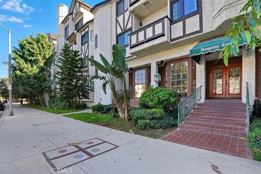Welcome to the highly sought-after Hampton Court building in prime Encino!

This well-maintained complex offers a formal lobby that creates a warm and inviting first impression.

This exceptional unit features a spacious living room with a cozy fireplace that opens to a private, relaxing patio—perfect for morning coffee or evening unwinding. The floor plan includes two en-suite bedrooms for comfort and privacy.

The gourmet kitchen boasts custom cabinetry, subway tile backsplash, and stainless-steel appliances, complemented by the convenience of an in-unit washer and dryer.

Additional highlights include two tandem parking spaces, a storage cabinet, and guest parking for visitors.

Community amenities feature a sparkling pool, spa, lush courtyard, recreation room, elevator, and earthquake insurance for peace of mind.

Enjoy close proximity to Ventura Boulevard, trendy shops, fine dining, and easy freeway access—offering the best of Encino living.

Few photos have been digitally staged.