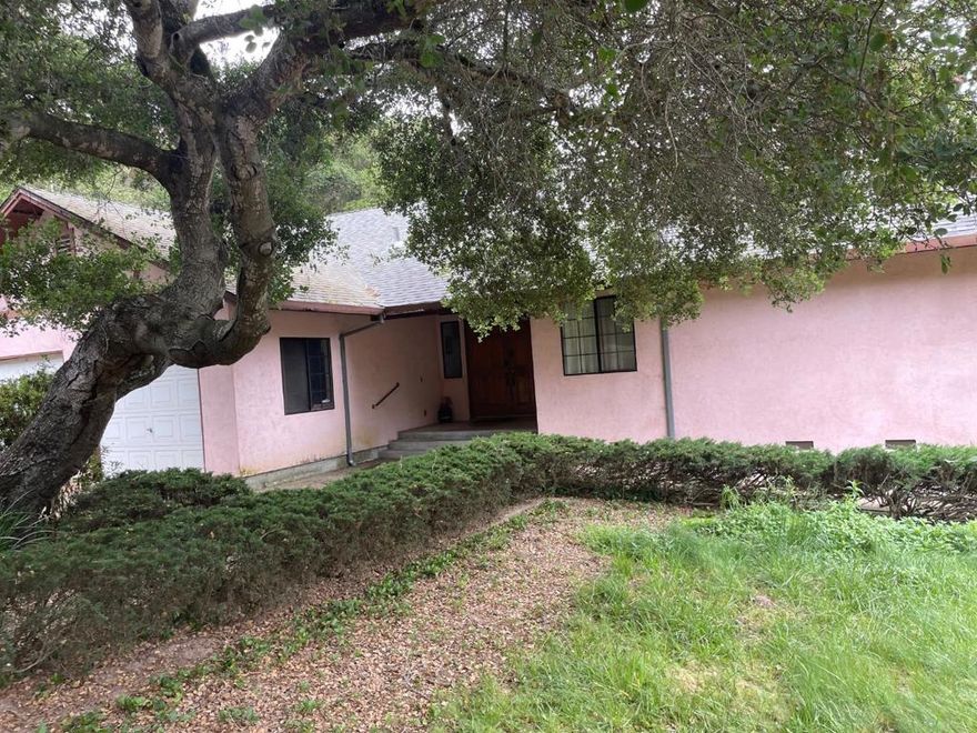 Great country home - Lots of possibilities - vaulted ceilings, skylights, lots of storage. Easy freeway access. Connection for motor home or as needed outside of home. Over 2 acres, 3 BR, 3.5 BA, 2263 SF. Double garage plus single car garage and workshop below home.