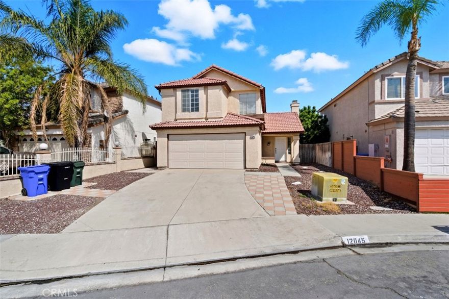Welcome to this charming two-story home for sale located in the sought-after Southridge Village community of Fontana. Set on a 3,600 sq. ft. lot, this 1,253 sq. ft. residence offers a comfortable and functional layout ideal for family living. The main floor features a bright and airy open-concept design with vaulted ceilings, a spacious living room with a fireplace, a dining area, and a kitchen with a breakfast nook that opens to the backyard—perfect for entertaining or enjoying a quiet morning coffee. A powder room and direct-access 2-car garage with laundry hookups add convenience to the main level. Upstairs, you’ll find three bedrooms and two full bathrooms, including a primary suite with both a walk-in closet and an additional sliding-door closet, plus a private ensuite bathroom featuring a double-sink vanity, tub/shower combo, and separate toilet area. The fenced backyard includes a patio space ideal for outdoor gatherings or family barbecues. Located close to parks, shopping centers, and reputable schools such as Oak Park Elementary, Canyon Crest Elementary, and Southridge Middle School, this home offers the perfect blend of comfort, charm, and everyday convenience.