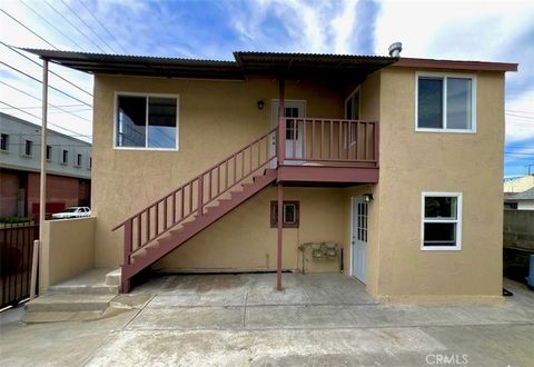 Photo of 1561 W 38th Place, Los Angeles, CA 90062 (MLS # DW26058390)
