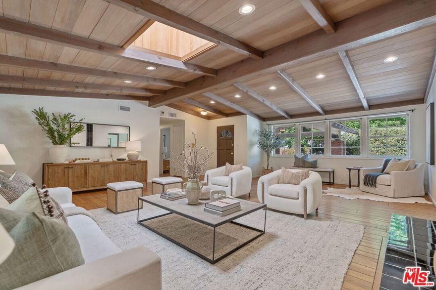 Thoughtfully Designed, Tucked Away, Truly a Tarzana paradise! Welcome to 4835 Corbin Avenue! This beautiful ranch style home is located in a prime South of the boulevard Tarzana location. Recently renovated including HVAC, Pool, Kitchen, Primary Bath, Electrical, Flooring, Insulation and more! This private home offers five large bedrooms, three bathrooms and plenty of living space. As you enter the home, you will be greeted by a large living room with beautiful exposed beam ceilings, skylight and walls of windows. The large kitchen and dining room offer plenty of space for gatherings and entertaining with multiple sliding doors overlooking the picturesque back yard. Step outside to your serene backyard retreat with a large pool and spa, plenty of patio space, and mature privacy hedges and trees. This home features a dual gated circular driveway perfect for added convenience and easy access. Enjoy all that this highly sought after area has to offer including famous hiking trails, parks and more!