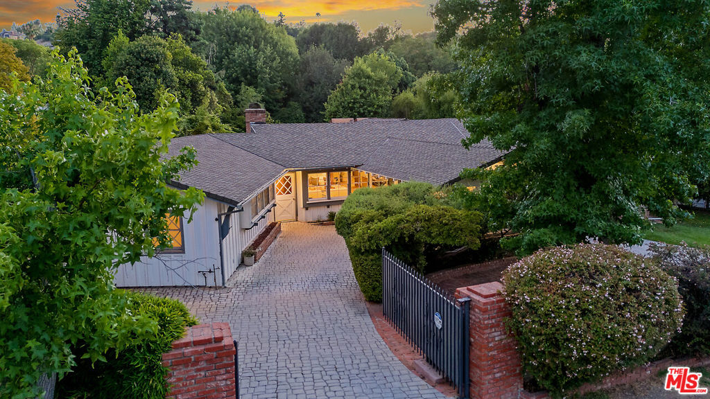 Thoughtfully Designed, Tucked Away, Truly a Tarzana paradise! Welcome to 4835 Corbin Avenue! This beautiful ranch style home is located in a prime South of the boulevard Tarzana location. Recently renovated including HVAC, Pool, Kitchen, Primary Bath, Electrical, Flooring, Insulation and more! This private home offers five large bedrooms, three bathrooms and plenty of living space. As you enter the home, you will be greeted by a large living room with beautiful exposed beam ceilings, skylight and walls of windows. The large kitchen and dining room offer plenty of space for gatherings and entertaining with multiple sliding doors overlooking the picturesque back yard. Step outside to your serene backyard retreat with a large pool and spa, plenty of patio space, and mature privacy hedges and trees. This home features a dual gated circular driveway perfect for added convenience and easy access. Enjoy all that this highly sought after area has to offer including famous hiking trails, parks and more!