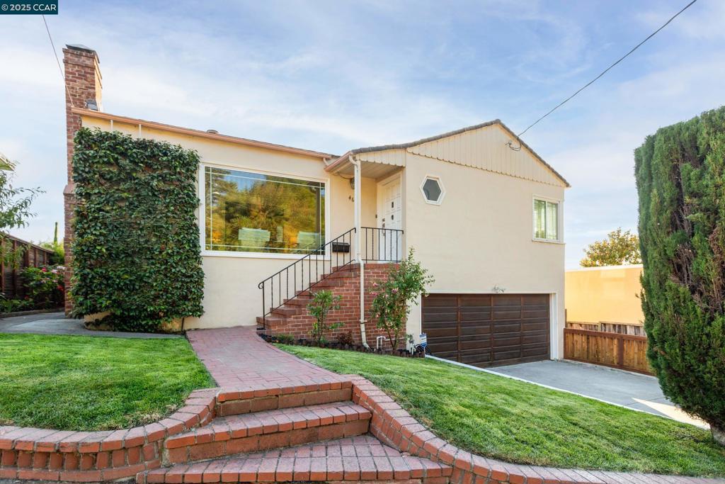 A Great opportunity to live in the Oakland hills with comfort views of the sf bay area! This charming home is nestled in the highly coveted neighborhood of upper Rockridge. The home is surrounded by a green lawn, mature fruit trees and flowers that make the home inviting. Inside the home offers beautiful hardwood floors throughout the bedrooms, hallways and entry. A spacious living room and a formal dining room is included for family gatherings or friends. Upstairs includes a bright kitchen with granite counter tops, a new oven, a new stove top and a generous family room. Downstairs offers a huge bonus area that includes a rhombus room with new flooring a full bathroom, a secondary kitchen with new countertops, and a private entry from the yard. This charming space adds flexibility that can be enticing to an extended family, or just a quite relaxing area. A two-car garage is attached, a large workshop for that handy owner and a wide range of storage area throughout the home. Enjoy living near, Lake Temescal, Village market, Terrace coffee shop, and Montclair village area. Also, minutes away from freeways, Rockridge Bart, highly rated public and private schools, and a wide variety of upscale dining. This gem is a golden opportunity that shouldn't be missed.