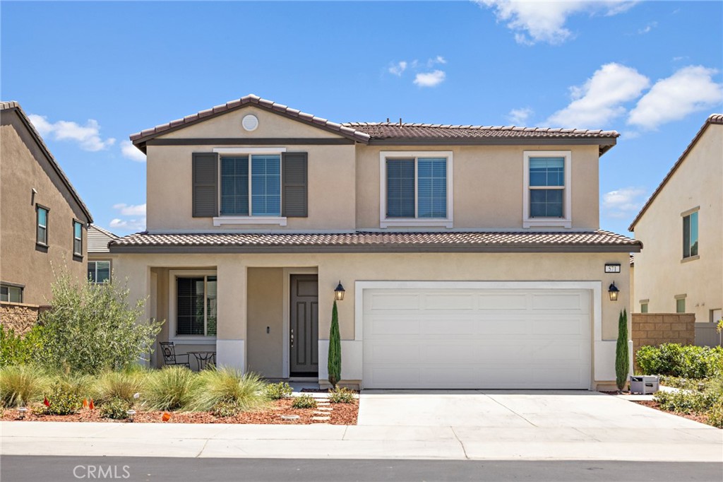 Welcome to 571 E. Alru St! Step inside this versatile floor plan, where the entry opens to a spacious bonus room, ideal for a home office, creative studio, or formal dining space. Toward the back of the home, enjoy an open-concept layout that seamlessly connects the dining area, great room, and a stylish kitchen featuring a center island and direct access to the backyard, perfect for entertaining. A traditional staircase leads to the thoughtfully designed second floor, where the private owner’s suite offers a walk-in closet and en-suite bathroom. You’ll also find a convenient laundry area, two additional bedrooms with a shared bathroom featuring dual sinks, and a flexible loft space ideal for relaxing or working from home. PROFESSIONAL PHOTOS COMING SOON.