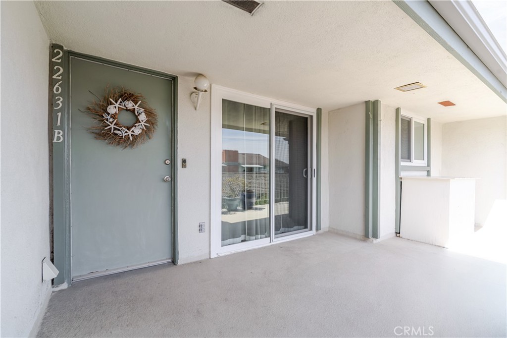 Welcome to this charming 2-bedroom, 2-bathroom condo located in a highly desirable New Horizons South Bay 55+ community in the heart of the South Bay. This well-kept and clean home offers a comfortable floor plan with plenty of natural light throughout and provides a wonderful opportunity to add your personal touch and make it your own. Enjoy the convenience of single-level living, a spacious living area with beautiful laminate flooring throughout and a cozy wood burning fireplace. The private balcony/patio is perfect for relaxing and enjoying beautiful sunsets. The community offers beautifully maintained grounds and amenities designed for an active and social lifestyle. This unit is ideally located near the clubhouse, quietly tucked away from the main road for added privacy. Residents of this vibrant 55+ senior living community enjoy access to a wide array of amenities, including a fitness room, clubhouse, pickleball court, two swimming pools, and a 9-hole golf course. The location is centrally situated in Torrance, close to excellent shopping, dining, beaches, and a farmers market.