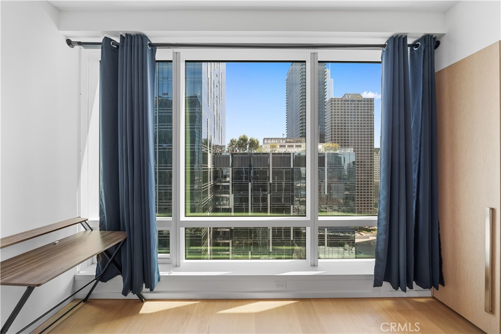 Experience urban luxury in this garden-view residence at Metropolis Tower 2, featuring floor-to-ceiling windows that overlook the serene community gardens. This home is an urban sanctuary, offering access to some of the most breathtaking amenities in Los Angeles.
Enjoy the largest SkyPark in Los Angeles, with Crypto.com Arena, the Financial District, South Park, and all of DTLA’s vibrant destinations just steps from your door.
Exclusive resident amenities include:
• Over 65,000 sq. ft. of indoor/outdoor lifestyle space at MetNine
• Olympic-sized pool with cabanas and outdoor dining pavilions
• Off-leash dog park and landscaped garden spaces
• Private cinema, billiards, yoga studio, and spa/steam rooms
• Expansive fitness center and video business center
• 5-star residential concierge service
• Access membership with dining and room discounts at Hotel Indigo
Utilities including gas, water, and trash are provided, along with ample guest and bicycle parking for all-inclusive living.