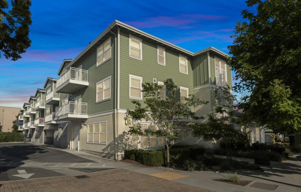 This rare midtown condo lives like a single level, blending comfort, convenience, and location in one seamless package. Tucked in a secure, elevator-access building built in 2015 with a locked lobby and garage parking, it offers peace of mind just steps from the best of Santa Cruz. Walk to the Rio Theater, grocery stores, and restaurants like Achilles, Akira, and Lillians or hit the harbor, nearby parks, or local trails for a sunset stroll or morning run. Inside, natural light fills a well-designed layout that includes a spacious primary bedroom with a full-size closet and a versatile second room perfect for guests, a home office, or both. The full kitchen features a gas range, dishwasher, microwave and ample counter space, ready for everyday cooking or weekend hosting. The open living area centers around a gas fireplace, with a large deck just outside for morning coffee or evening wind-downs. In-unit laundry adds everyday ease, and guest parking makes it easy to welcome company. Amenities include a peaceful garden, bocce court, fire pit, extra storage, and lounge-style common room for gatherings. Whether you're looking for simplicity, style, or a connection to everything Santa Cruz offers, this place makes living easy!