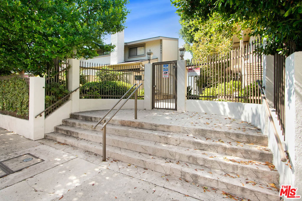 Beautifully remodeled townhouse in a gated community with resort-style amenities including pool, jacuzzi, club room, BBQ, and picnic area. This bright home features an open living and dining area with fireplace, powder room, and modern kitchen with stainless steel appliances and a private patio. Upstairs are two bedrooms and two bathrooms. Primary bedroom is ensuite with a walk-in closet. There is a two car side-by-side attached garage and a bonus room that could be used as an office or gym downstairs. Extra storage included.