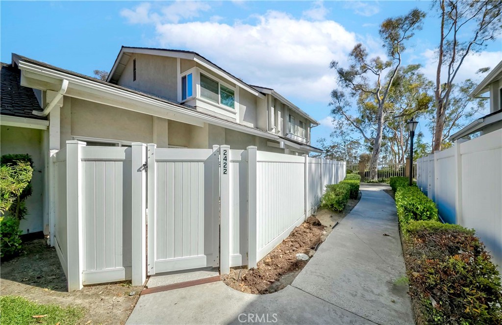 Discover this hidden gem in The Bluffs at Coyote Hills, where peaceful living meets everyday convenience. Surrounded by mature trees and scenic walking trails, this beautifully maintained 3-bedroom, 1.5-bath townhome offers a rare combination of privacy, comfort, and modern upgrades.
Step into the open-concept living room, featuring soaring ceilings, abundant natural light, and recessed lighting that highlights the bright and airy feel of the space. The updated kitchen includes granite countertops, modern cabinetry, and direct access to the private patio, perfect for morning coffee or evening gatherings. Dual-pane windows and sliding glass doors enhance energy efficiency and provide a seamless indoor-outdoor connection.
Upstairs, you'll find three spacious bedrooms, including a well-appointed primary suite and a full bathroom with upgraded finishes. The attached two-car garage offers side-by-side parking and direct kitchen access for added convenience.
Enjoy resort-style amenities in this well-maintained community, including a pool, spa, playground, and basketball court. Take advantage of nearby parks, golf courses, shopping centers, top-rated schools (Sunset Lane Elementary & Parks Jr. High), and easy access to restaurants and conveniences.
This home is an exceptional opportunity to live in one of Fullerton’s most desirable neighborhoods don’t miss your chance to make it yours!