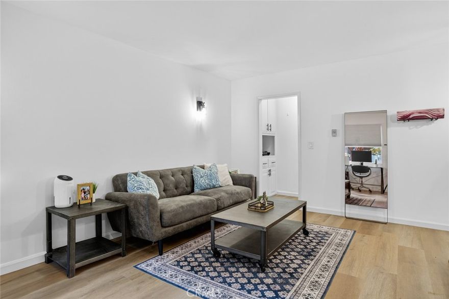 Turnkey 1BD/1BA condo in the heart of Long Beach’s vibrant East Village Arts District! Welcome to 901 Linden Ave, Unit 8 — a charming ground-floor unit tucked inside a secure, gated community just moments from Downtown, Alamitos Beach, and Shoreline Village. Whether you're a first-time buyer or an investor, this light-filled condo offers the perfect mix of comfort, style, and opportunity. Inside, the kitchen pairs crisp refreshed cabinetry with classic subway tile, sleek black hardware, and updated countertops. The spacious living area provides plenty of room to relax or work from home, with large windows that fill the space with natural light and offer views of the courtyard. The spacious bedroom offers mirrored closets and a built-in projector with screen - perfect for winding down with your favorite films.The bathroom has a fresh, modern feel with a clean white vanity, matte black fixtures, and a full-sized soaking tub. Additional highlights include new luxury vinyl plank flooring throughout, fresh interior paint, and a prime location with incredible walkability. You’re just one block from the Metro Blue Line, minutes from the beach, and surrounded by the vibrant energy of Downtown Long Beach. Enjoy easy freeway access and explore local favorites like Shoreline Village, The Pike, and the neighborhood’s eclectic mix of restaurants, coffee shops, and boutiques. Whether you're a first-time buyer ready to put down roots or an investor looking for a smart rental or Airbnb opportunity, this one checks all the boxes. Don’t miss your chance to own a slice of Long Beach!