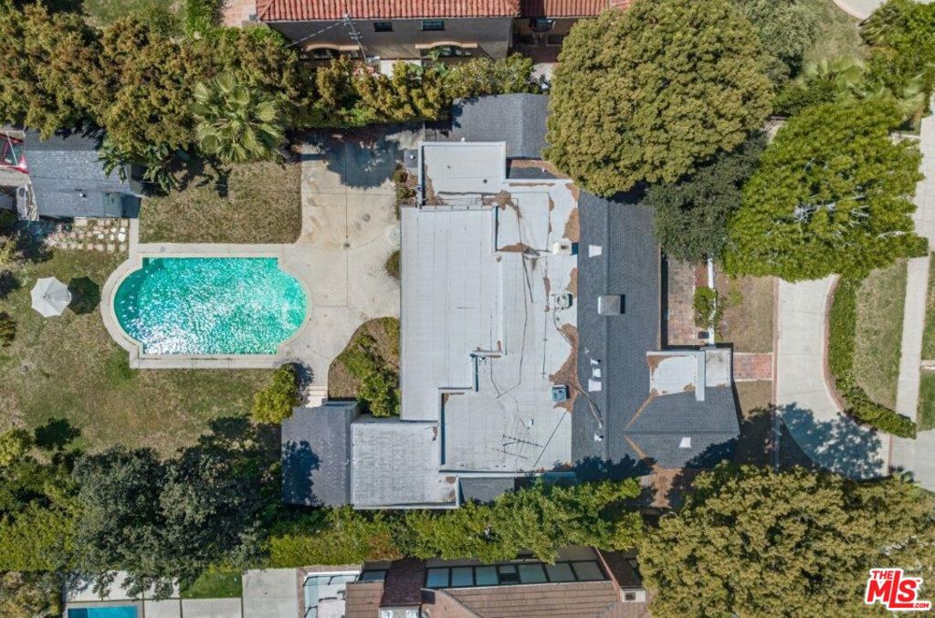 Exceptional Beverly Hills Flats Development Opportunity! Located in the highly coveted Beverly Hills Flats, this property presents a rare opportunity to completely redesign and build your dream home. The generous 16,214 square foot lot, which includes a swimming pool, is situated on a quiet, tree-lined street only a short distance from trendy restaurants, posh shopping and entertainment venues. This property is a must-see for developers or creative first-time home builders, due to its prime location and potential to create a fully customized living space. Don't miss out on the chance to turn your vision into a reality. Discover the endless possibilities that await.
