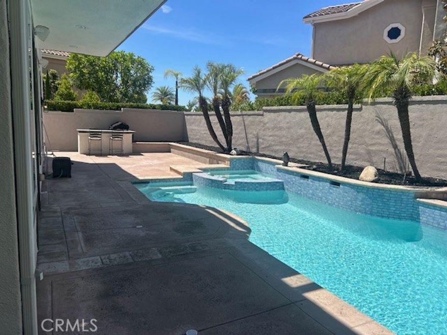 BEAUTIFUL POOL Home. Welcome to 27041 S Ridge Dr in the highly sought after charming area of Pacific Hills Neighborhood! The main level of this two-story home is occupied by a expansive open floorplan shared between the family room, kitchen and dining room. This amazing Turnkey Residence features 4 bedrooms, 4 Full Bathrooms with Inground remodeled Pool with built in BBQ area. TRUELY TURNKEY CONDITION .. .. .. BRIGHT & OPEN LAYOUT.. Totally Remodeled Home. Three car garage is situated on the end of the CDS. As you enter this beautifully remodeled home there is a large family room and kitchen. The kitchen is brand new featuring all new Appliances, white shaker cabinets and quartz countertops. New Luxury Vinyl plank flooring throughout the home and New interior/exterior paint. A peaceful well landscaped private gated front yard. Backyard is very spacious, great for entertainment. Close to major freeways, I-5, great restaurants, award winning top ranked schools and shopping! Enjoy the good life in Mission Viejo and come visit this fabulous home today!
