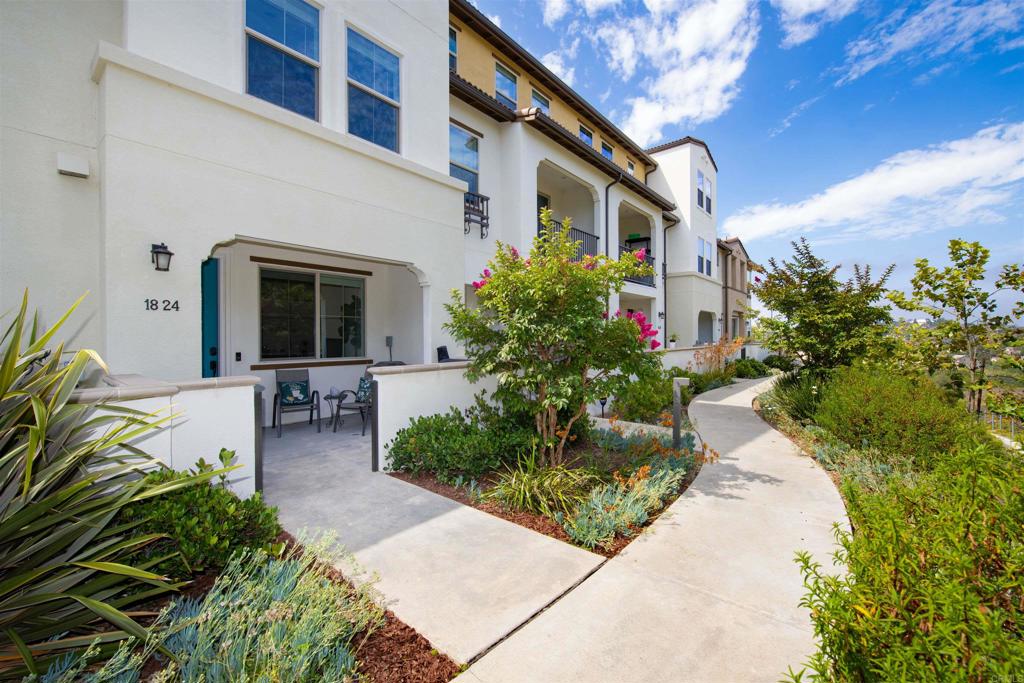 Experience the best of Oceanside living in this turnkey 2022-built townhome, featuring over 40K in modern UPGRADES, SMART TECHNOLOGY, preserve VIEWS, and resort-style amenities! This spacious home offers 3 bedrooms plus 2 versatile BONUS ROOMS—ideal for a home office, reading nook, playroom, or creative studio. Enjoy the convenience of an ATTACHED 2-car garage and the incredible savings of fully PAID SOLAR. Sellers averaged less than $7 a month in energy costs over the past year! Thoughtful upgrades include luxury plank flooring throughout, an open-concept living area with wired TV nook, and a modern kitchen featuring QUARTZ countertops, stainless steel appliances (all included), and abundant cabinetry. SMART HOME features put lighting, climate, and security at your fingertips! Step outside to resort-style amenities: swimming pool, playground, walking and biking trails, pet-friendly parks, and BBQ picnic areas—perfect for relaxing or entertaining. NO Mello-Roos & low HOA dues. This is coastal living at its’ best! Schedule your showing today!