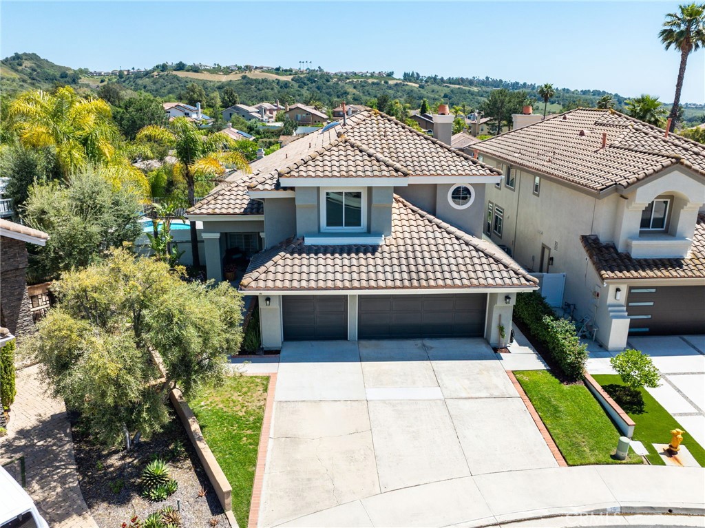 Massive price reduction! Act Fast! By far the best 3000+ sq. ft. buy in the area!!! Enjoy your own private retreat with great valley views! Entertain in you serene backyard with pool, spa and views! This awesome home has loads of custom upgrades that include upgraded modern wood style tile and vinyl flooring, remodeled gorgeous kitchen with quartz counters, beautifully remodeled custom baths with quartz counters, added dual pane windows and large folding slider door to pool, custom upgraded stairs, custom lighting plus loads of added recessed lights, custom white wood shutters, awesome cozy fireplace to warm up to, huge master retreat, 1 bedroom + 1 bath down, high ceilings with loads of windows, etc. etc.! Light, bright and airy open concept floorplan! Premium quiet mid cul de sac location! Crazy low HOA dues and no Mello Roos! This is the home you've been dreaming about! Priced to sell fast...run don't walk!!!!!!!!