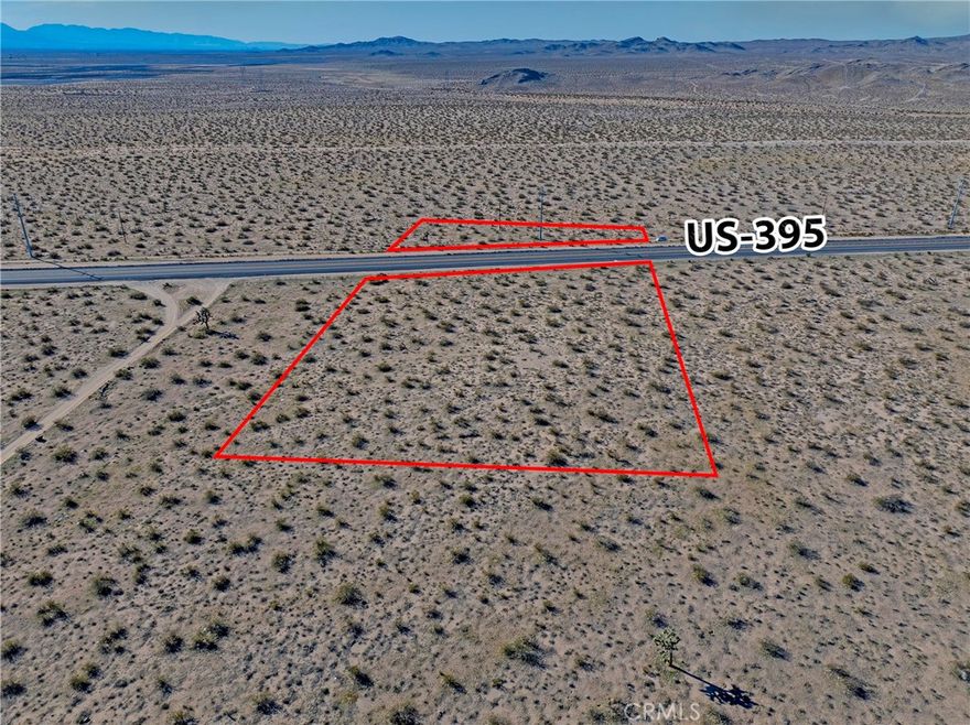 High-Visibility Land that splits US Highway 395 – Adelanto, CA Opportunity to acquire 4.14 acres of land with frontage and visibility along US Highway 395, a major north–south travel corridor through the High Desert. Highway 395 serves as a primary route connecting Adelanto with Victor Valley and surrounding markets. The property is currently zoned Residential per public records. Buyer to independently verify zoning, land use, and development potential, including the possibility of commercial or mixed-use, with the City and County. Located within the path of future development, this parcel is well suited for investment, buy-and-hold, or future build opportunities This property may be sold together with an adjoining parcel of just over 1 acre, creating a larger development opportunity. APN: 0460-142-25-000 | Approx. 1.25 acres.