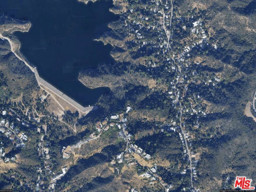 Adjacent to city-owned land (potential future access negotiations).  It is part of three contiguous 2,500 SF parcels where this lot is on one end and a government owned lot on other end, with a middle parcel that recently sold. This creates a total of 5,000 SF of private land that could be attractive for larger development.