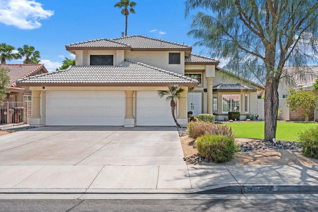Located on a cul-de-sac in a quiet and serene North La Quinta neighborhood, a beautifully appointed smart home designed for both style and function is ready for a new chapter! Inside, soaring ceilings create a bright, open ambiance with no carpet throughout for a clean, modern aesthetic. The chic, bright kitchen reveals an ideal layout with quartz waterfall edge counters, elegant shaker cabinets with strategically placed glass cabinet faces, counter seating and a large pantry to complete the utility of this stunning space. All three full bathrooms echo the same modern flair, each unique in its own style, while custom closets and automated blinds add an elevated touch of privacy and organization. Generous in size, all 4 bedrooms, including a ground floor bedroom and full bath, extend value and flexibility for multiple audiences. An additional office space downstairs with separate mini-split system and open loft upstairs advance desirable design options for custom living. Step outside to a fully equipped outdoor entertaining area with an elaborate built-in BBQ complete with sink, refrigerator and leisure seating, artfully designed paver patio system, sparkling PebbleTec and tile pool and fire pit area framed by thoughtfully designed hardscape and landscape. The home comes equipped with a sophisticated Control 4 smart home system to control lighting, climate, ambiance and secure entry. With schools, shopping and dining in close proximity, this home offers the perfect pairing of comfort and easy accessibility.