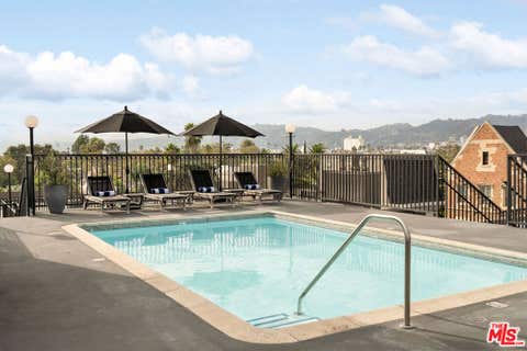 Photo of 585 N Rossmore Avenue #407, Los Angeles, CA 90004 (MLS # 26843049)