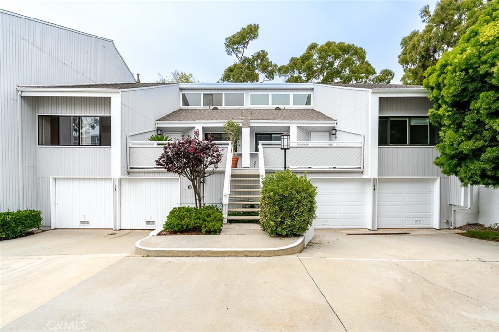 Experience authentic SoCal coastal living in this luxury townhome designed for the ultimate seaside lifestyle. Only a short stroll to the pristine classic California beaches with its surrounding restaurants and shops. Located in the prestigious Newport Crest complex featuring beautifully maintained grounds with tennis courts and pool. All new wood look laminate floors. 2-bedroom, 2-bathroom and loft added with permit. Spacious 2 car garage with storage and work table. Large wooden deck with lush garden views.* Built 1973 * Sq. Ft. 1170 plus loft. * HOA Fees $600 per month * Trust sale, sold in present “as is” condition . Buyer to satisfy condition with a fully licensed home inspection. (All information deemed reliable but not guaranteed) .
