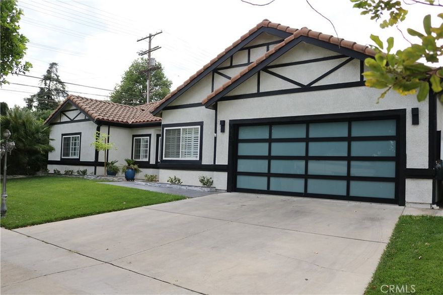 WELCOME TO THIS STUNNING NEWLY REMODELED RESIDENCE SET WITHIN AN EXCLUSIVE GATE COMMUNITY. FEATURING 4 BED AND 3 BATHS, THIS HOME COMBINES MODERN ELEGANCE WITH EVERYDAY COMFORT. STEP INSIDE TO AN OPEN AND AIRY FLOOR PLAN WITH ABUNDANT NATURAL LIGHT, NEW DESIGNER FINISHES, AND SPACIOUS LIVING AREAS IDEAL FOR BOTH RELAXATION AND ENTERTAINING. THE GOURMET KITCHEN SHOWCASES SLEEK COUNTERTOPS, PREMIUM CABINETRY, AND HIGH-END APPLIANCE. THE PRIMARY SUITE OFFERS A SERENE RETREAT WITH A SPA-INSPIRED BATHROOM AND GENEROUS CLOSET SPACE. EACH ADDITIONAL BEDROOM IS WELL-APPOINTED, WHILE THE UPDATED BATHROOM HIGHLIGHT CONTEMPORARY STYLE AND CONVENIENCE. ENJOY THE PRIVACY, SECURITY, AND PRESTIGE OF GATED LIVING, ALL WHILE BEING MINUTES FROM SHOPPING, DINING, TOP-RATED SCHOOLS AND CSUN. TRULY A MOVE-IN-READY HOME THAT BLENDS LUXURY WITH LIFESTYLE. HOUSE DO HAVE PURCHASES SOLAR SYSTEM, BUYER TO ASSUME SOLAR.