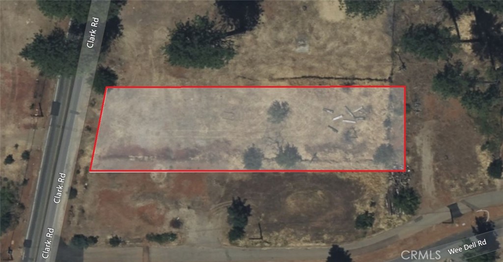 Discover the perfect opportunity to build on this spacious 0.5-acre lot located on the highly visible and accessible Clark Road in Paradise - offering flat, usable land, a wide frontage, and convenient access to local shops, schools, and services, this parcel is ideal for your future home, vacation home, investment property, or potential mixed-use vision. Get in your car, take a cruise, and check it out!